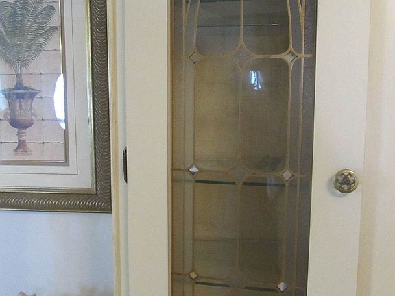 Ornate glass cabinet