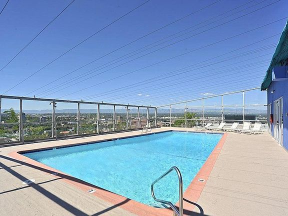 16th floor roof top pool with panoramic views of the Rocky Mountains