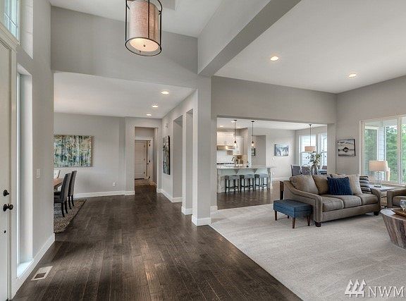 Breathtaking Open Concept Living/Dining/Kitchen Space *Photo of similar home on different lot*