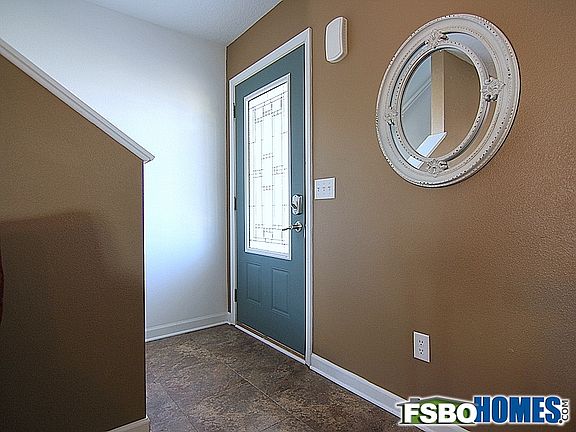 Front Entry with Inlay Glass Door and New Flooring