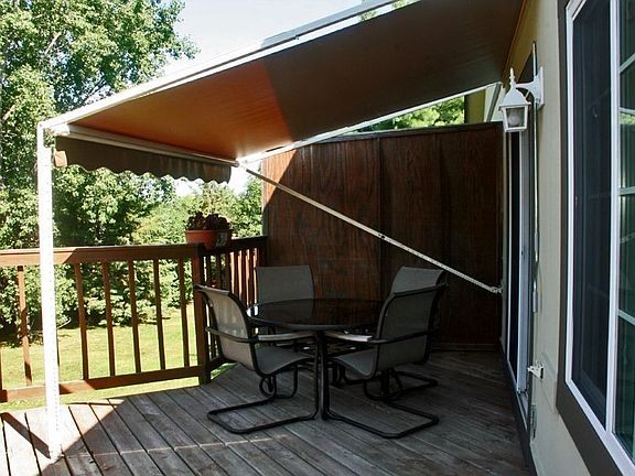 Large deck with awning-great for summer entertaining and relaxing