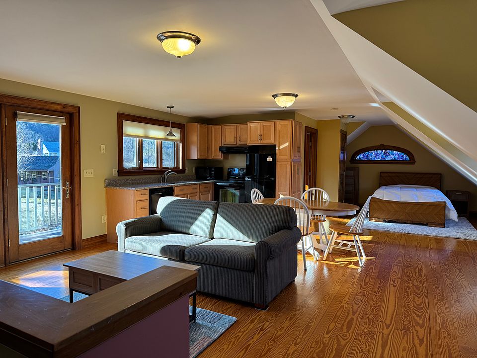view of studio - top of stairs