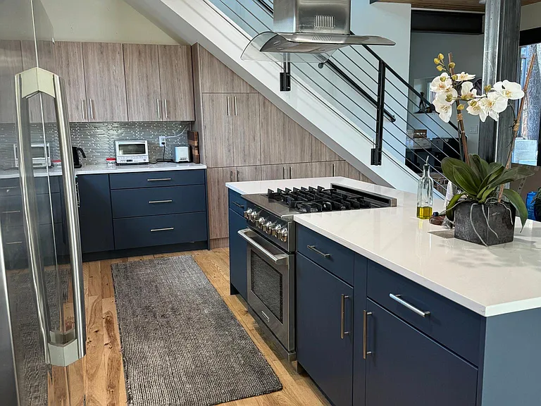 view of kitchen island standing near freezer