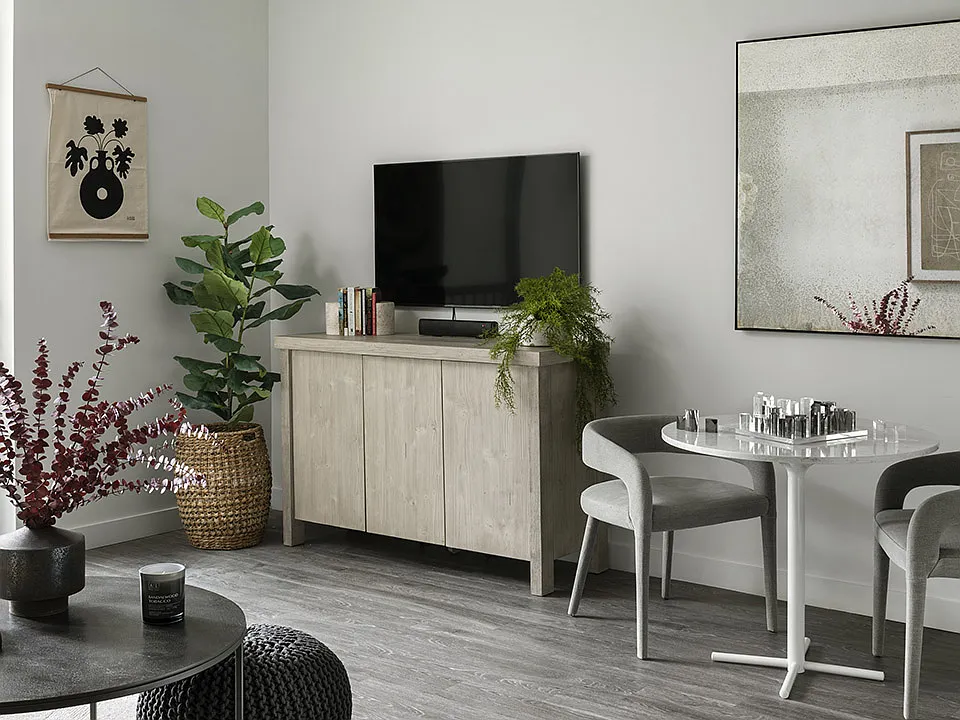 Apartment Living and Dining area with wood floors.
