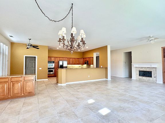GREAT ROOM WITH FIREPLACE AND BAR COUNTER