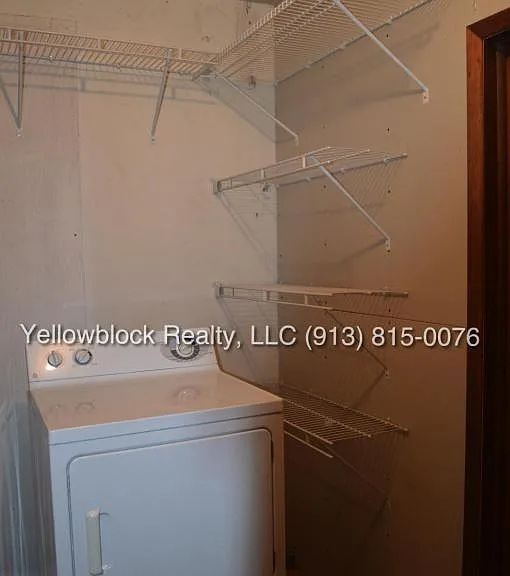 320 E 79th Ter — Photo 14