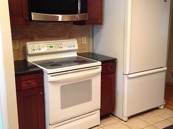 All appliances stay! Electric stove, large refrigerator, new