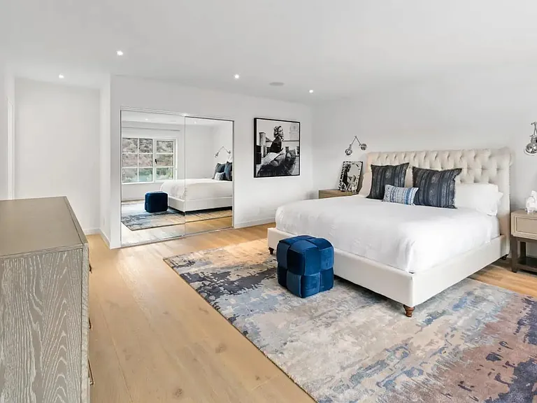 Guest bedroom with Modern accents and Luxurious King size bed.