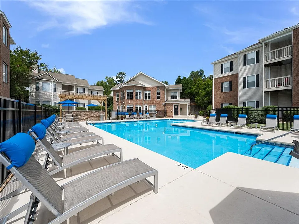 Sparkling swimming pool with sundeck