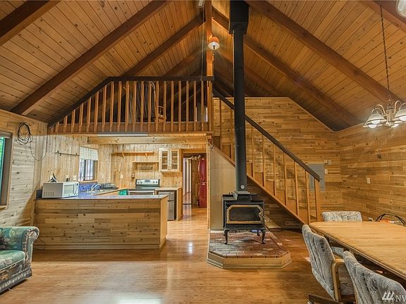 Welcoming great room with wood burning stove!