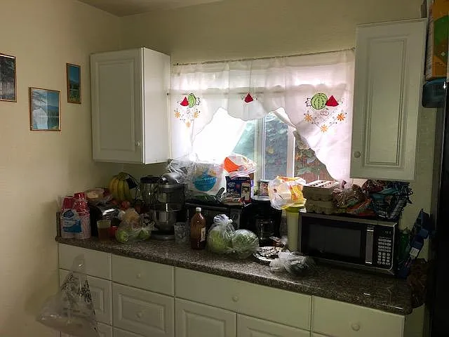 Large kitchen with granite countertops