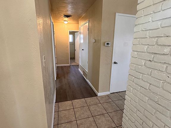 This hallway faces the 3 bedrooms, 1 bathroom and hall closet