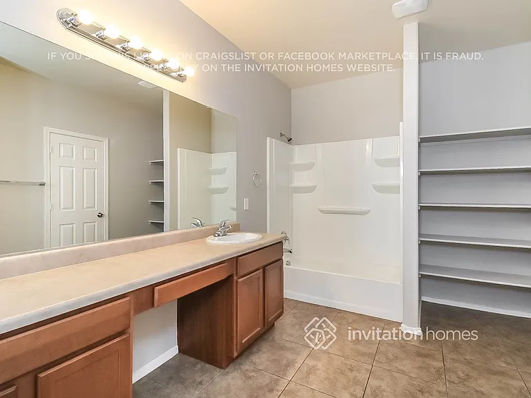 6778 W Wethersfield Rd — Photo 12