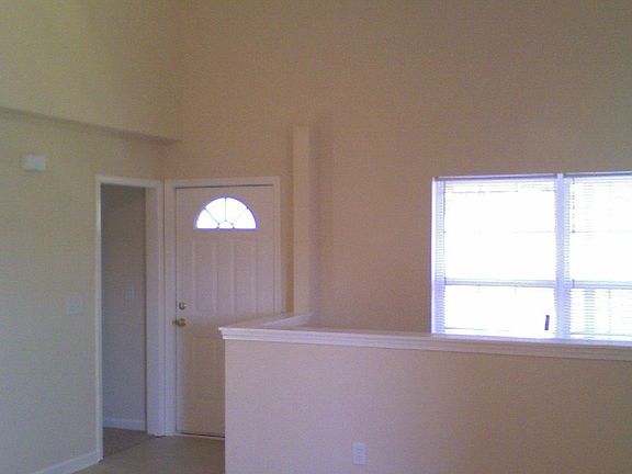 Vaulted Ceiling and a ceiling fan in the Master Bedroom
