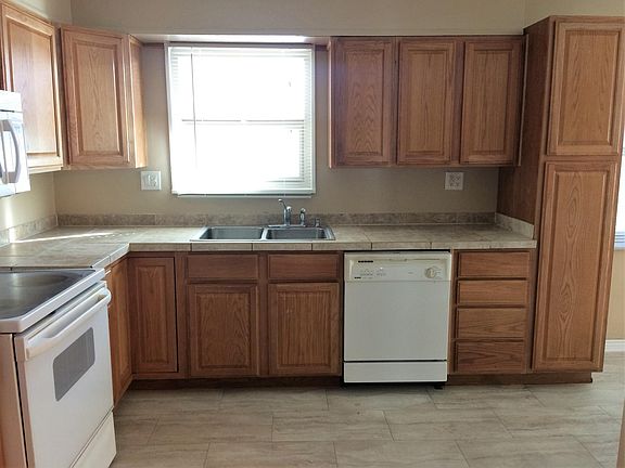 Updated kitchen with ample cabinet space.