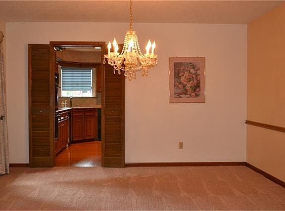 Formal Dining Room with New Carpet.