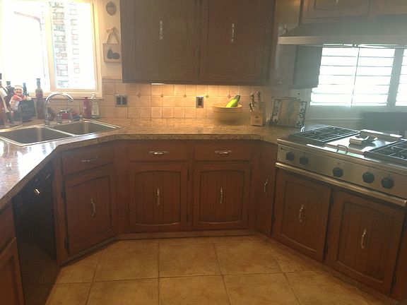 Granite tile, Bosch Diswasher, GE monogram stove 17" floor tile