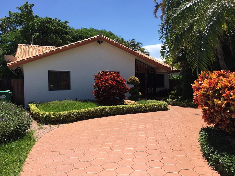 Front Circular Driveway with Stamp Concrete and Plush Landsc