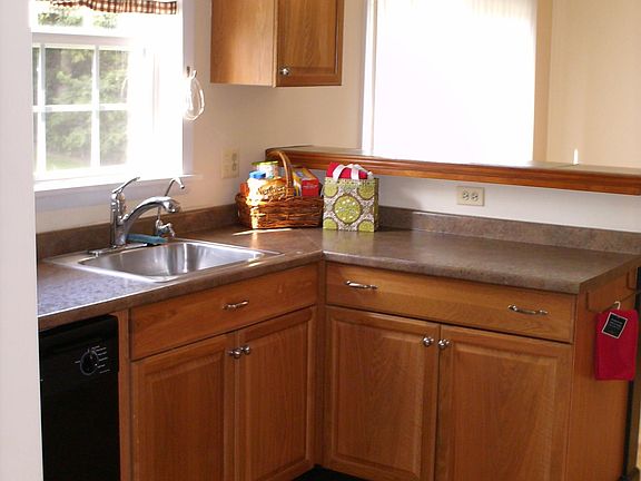 Kitchen has dishwasher and gas stove.