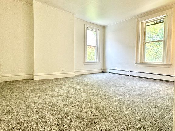 10 foot ceiling and NEW carpeting in your large living/sleeping room.