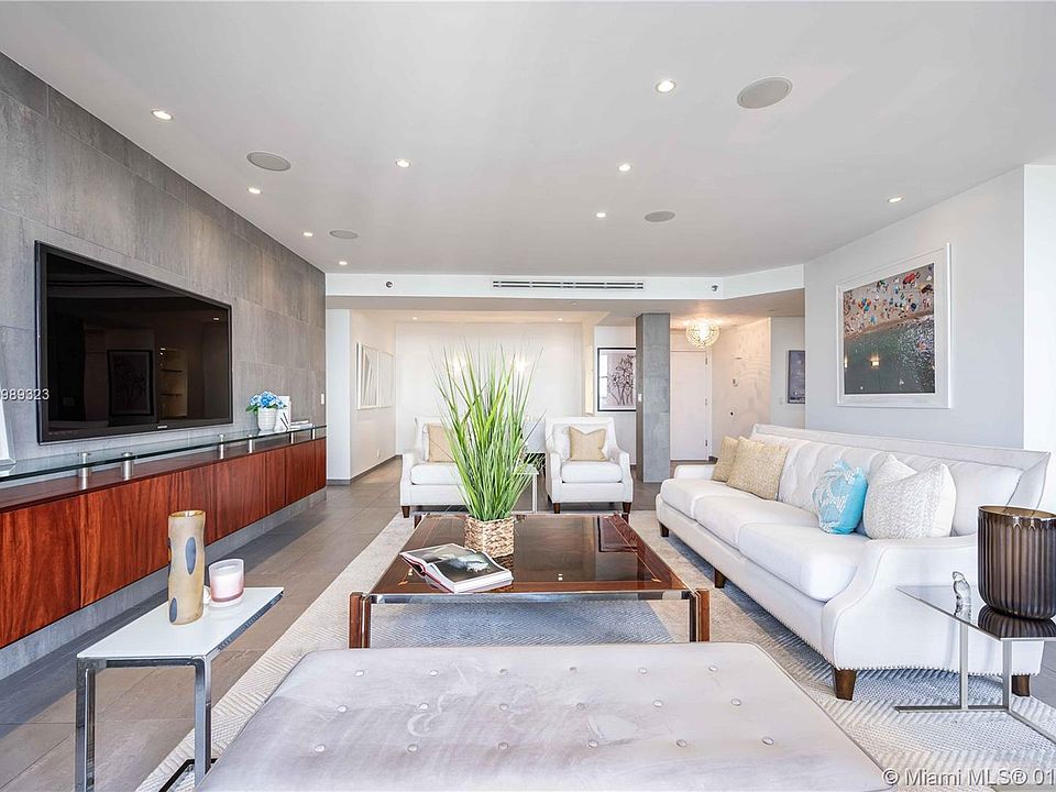Welcome home!  Large formal living room looking towards the entrance.
