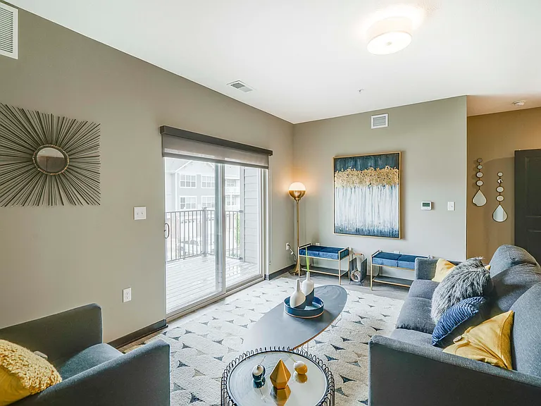 Relax in the bright and stylish living room of our 2-bedroom Magnolia, perfect for entertaining or unwinding.