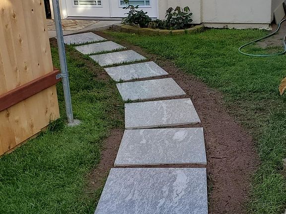 Newly constructed 6 foot fence separating the properties