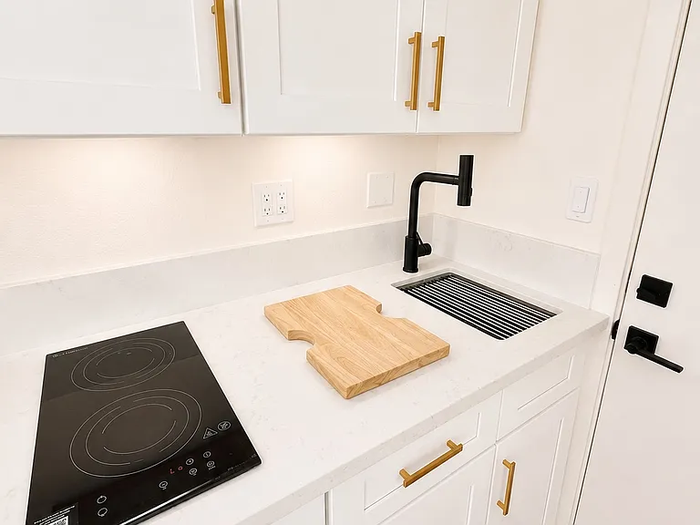 Kitchen with sink cover/ cutting board