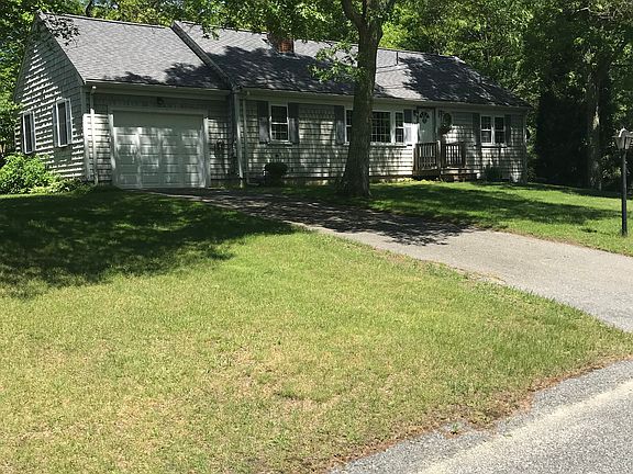 Left view of home and garage