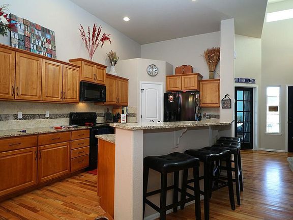 Open Concept Kitchen with Vaulted Ceilings