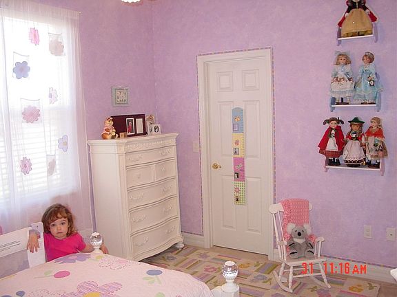 Bedroom with current paint and walk-in closet.  New carpet since