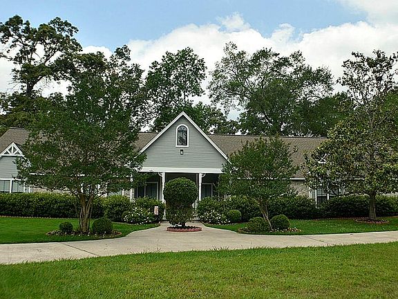 Large 1-story home on a quiet 2.37 acre, culdesac lot.