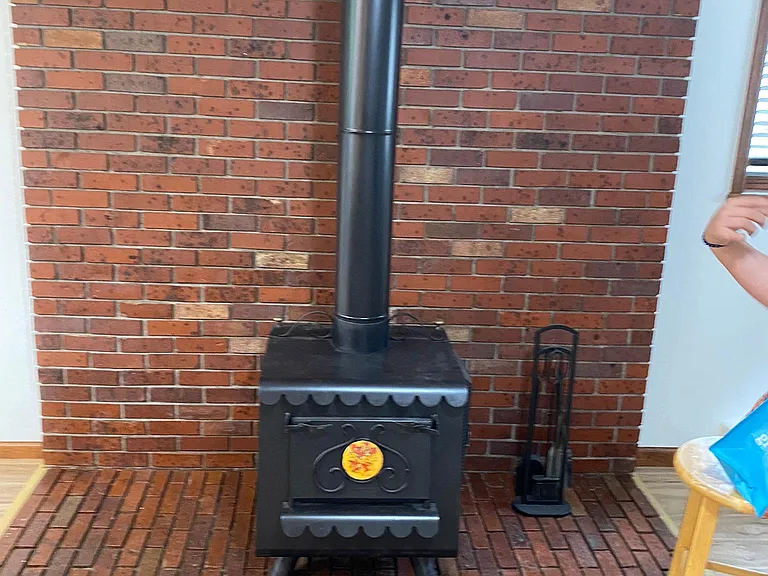 This woodburning Earth Stove is amazing as well as beautiful. Some of our renters have used it as the main source of heat in the winter