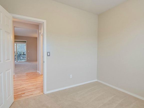 Office room downstairs with two big windows for natural light
