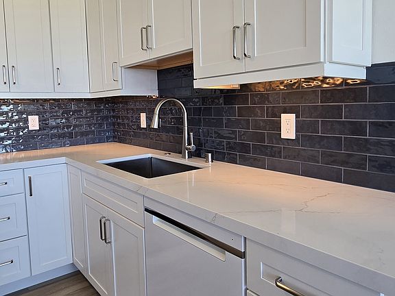 Large Basin Sink, High Efficiency Dishwasher & under-cabinet Lighting