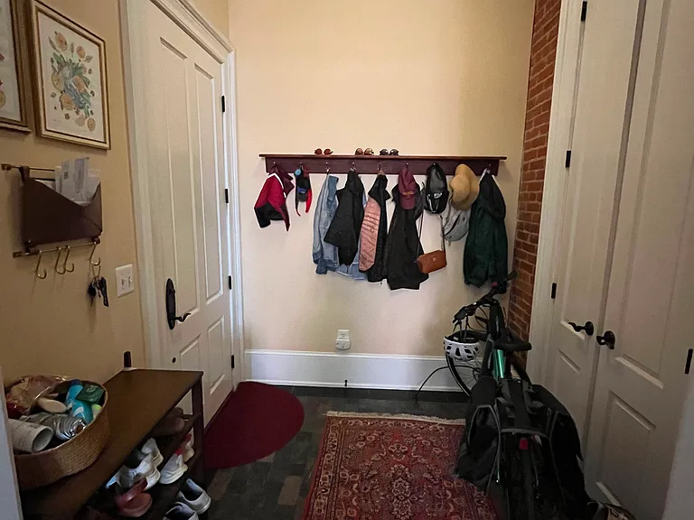 Front entrance to condominium. Front closet contains the HVAC system.
