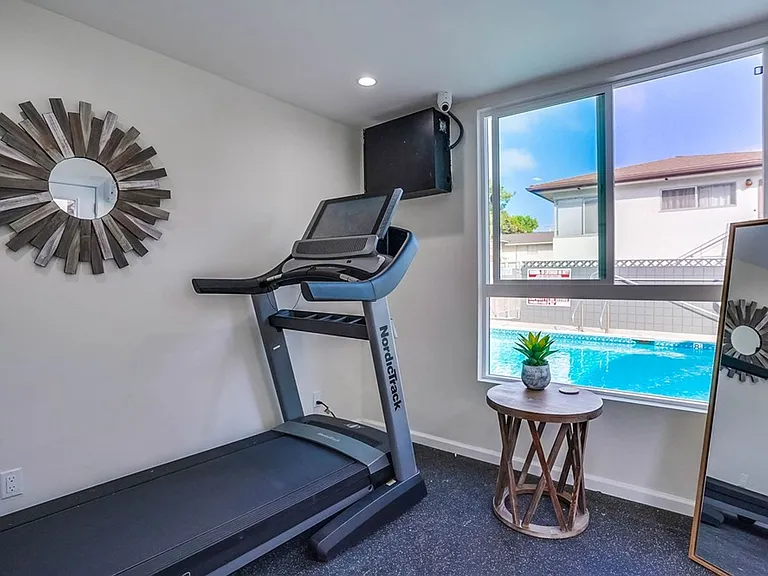 Retro Style Apartment Building with Pool and Gym - Secure, Modern and Lease-Ready! — Photo 24