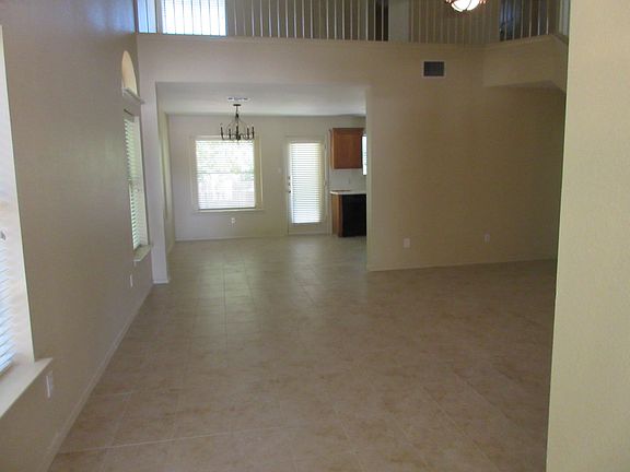 View from entry thru living room to kitchen area