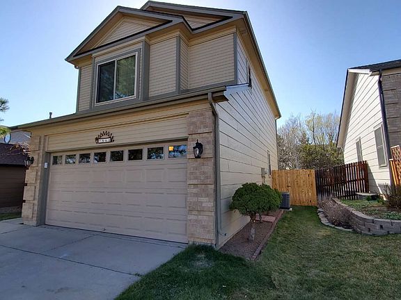 Front View of Garage and North Side of Home