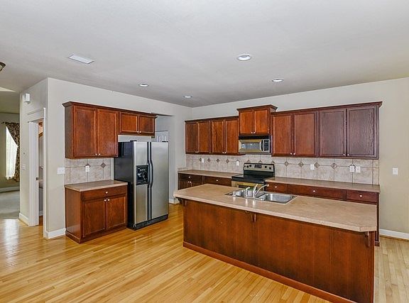5th image of 15121 Daffodil Street Ct E