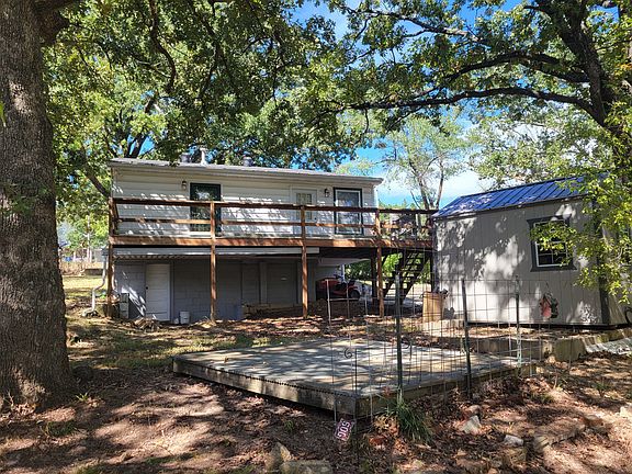 Rear deck, shed.