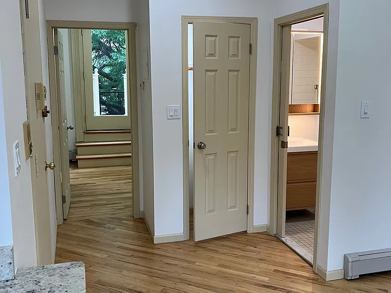 Coat closet door and bathroom