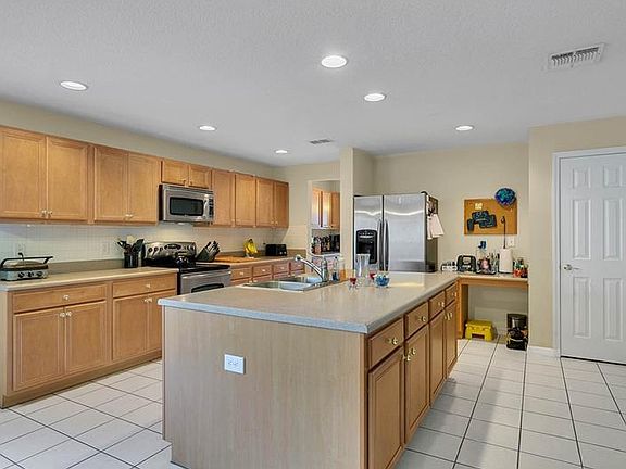 4th image of 2528 Wild Tamarind Blvd