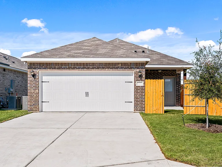 The Tulip has an attached two-car garage.