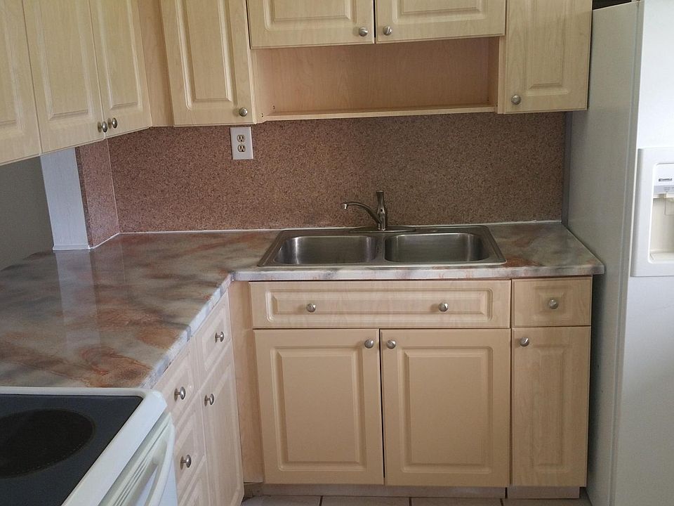 Remodeled kitchen countertops, and cabinets with lots of storage space