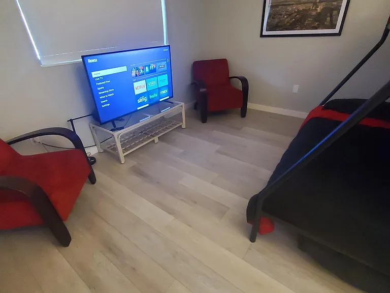 65 inch smart TV and 3 beds