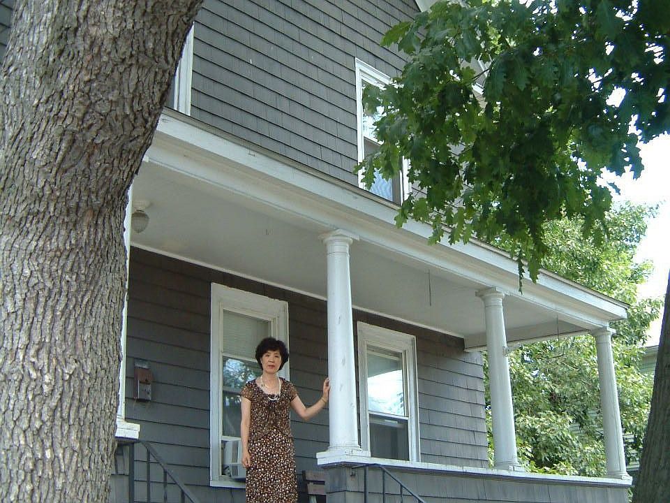 Front shaded by 2 large tree