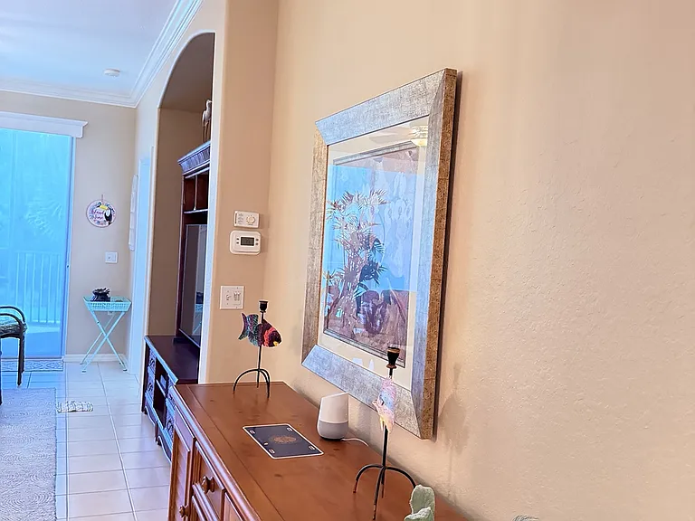 Entrance leading to living room with Smart TV