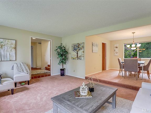 The living room is open to the dining room, creating an easy flow for entertaining. 