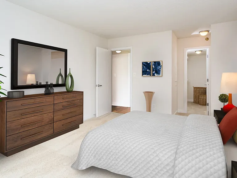 Carpeted Bedroom with Walk-in Closet